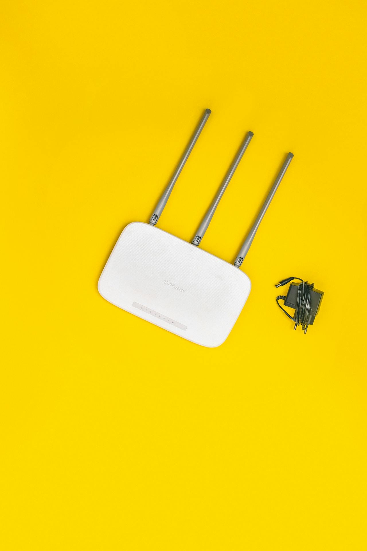 a white internet hub on a yellow background